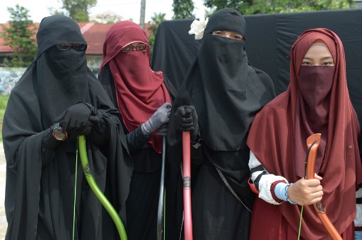 Women in Niqab Complain Of Police Harassment over Facemasks